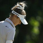 Nelly Korda slikt een 10 op een par 3